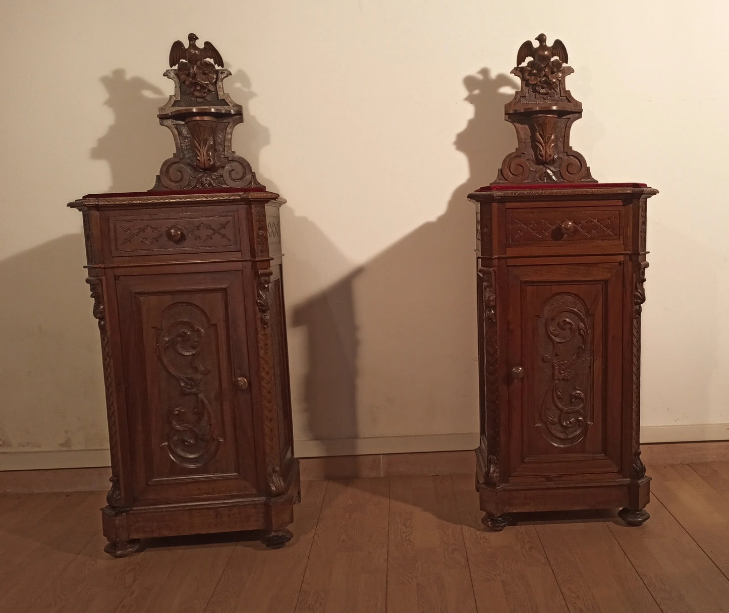 Pair of antique carved wood side cabinets in noce from a 19th-century italian cassettiera noce set of three
