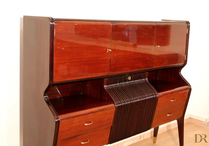 Credenza di Osvaldo Borsani in mogano lucido con cassetti e ante curve con maniglie dorate anni 50