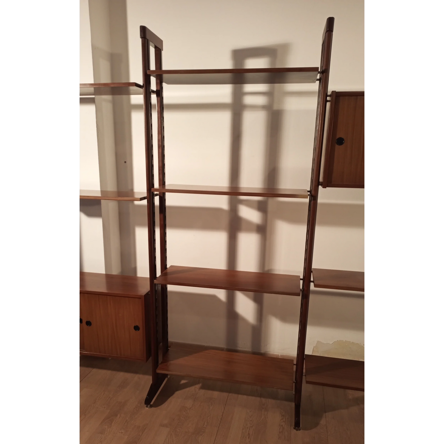 Wooden shelving unit with vertical posts and horizontal display shelves, libreria vintage modulare