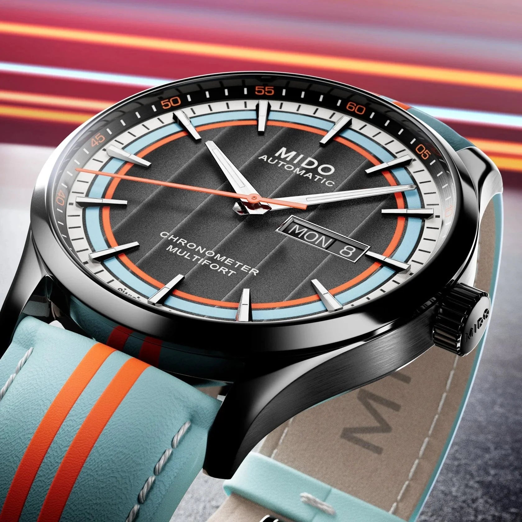 Mido multifort chronometer design deciso dell’orologio con quadrante nero, accenti arancio e azzurro, cassa acciaio PVD nero