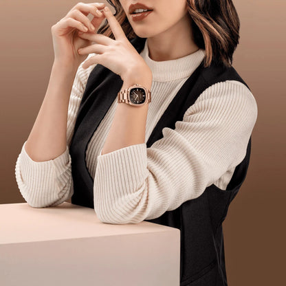 Mido orologio Multifort TV 35mm con finitura pvd oro rosa, quadrante nero e acciaio finitura pvd indossato al polso
