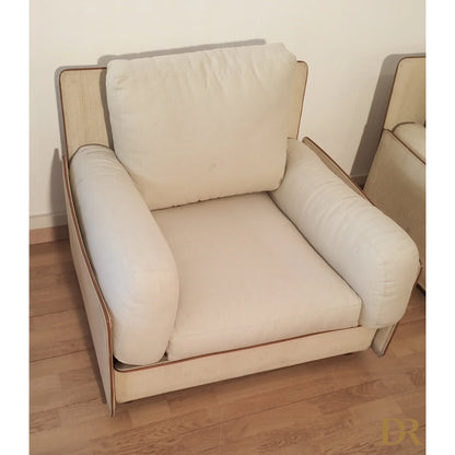 Divano modulare di riccardo arbizzoni modello redifiori set con poltrona imbottita color crema e rifiniture in legno